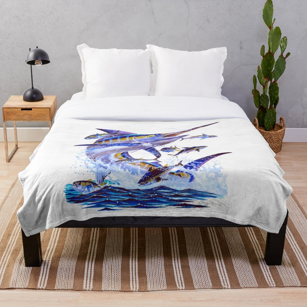 Plush blanket featuring a vibrant blue marlin and tuna design by marine artist Carey Chen