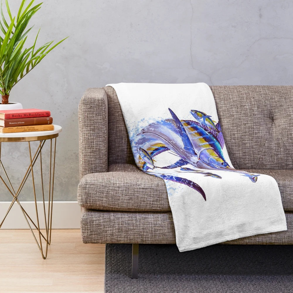 Plush blanket featuring a vibrant blue marlin and tuna design by marine artist Carey Chen