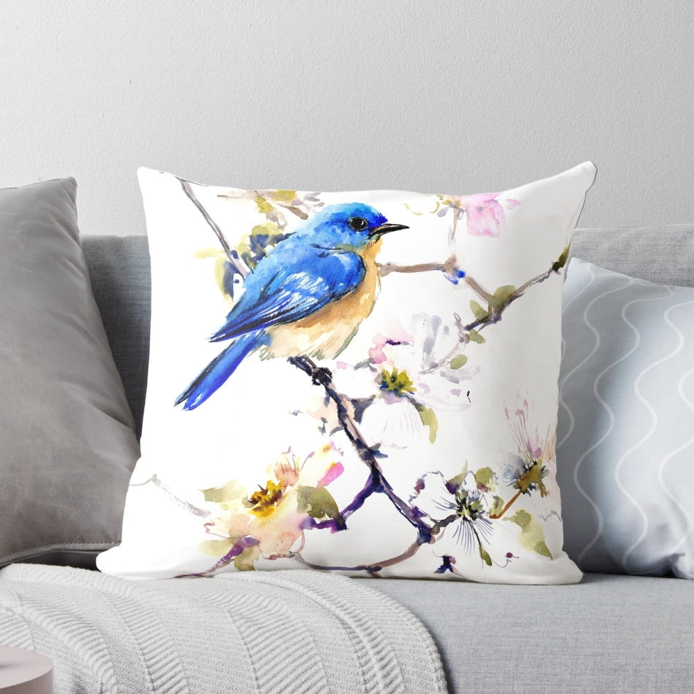 Vibrant watercolor painting of a bluebird perched on a dogwood branch with spring flowers