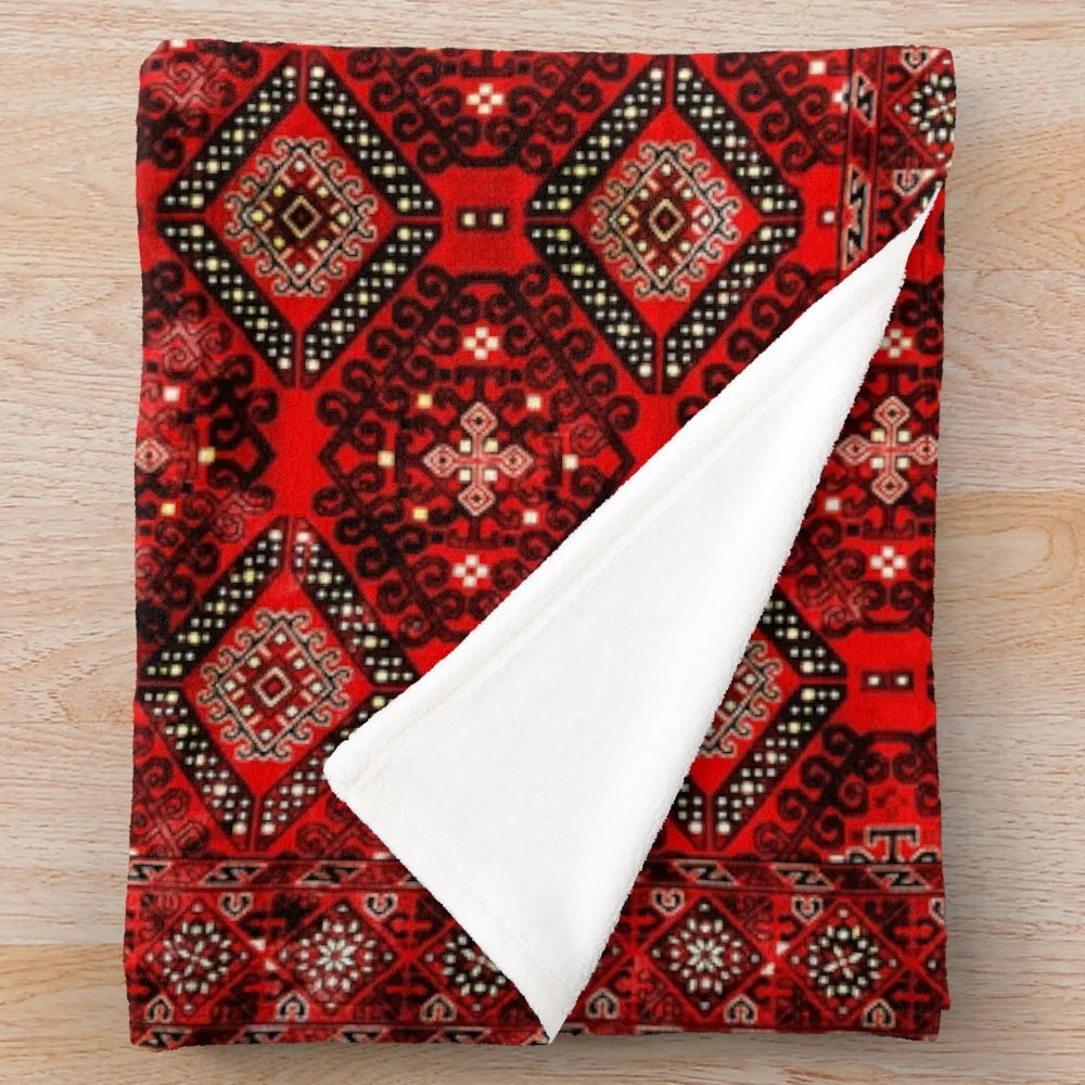 Vibrant bohemian-style plush blanket with intricate geometric patterns and oriental heritage influences