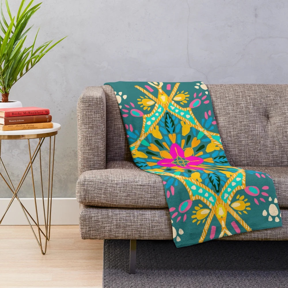 Bohemian-inspired plush blanket with colorful mandala and sacred geometry designs