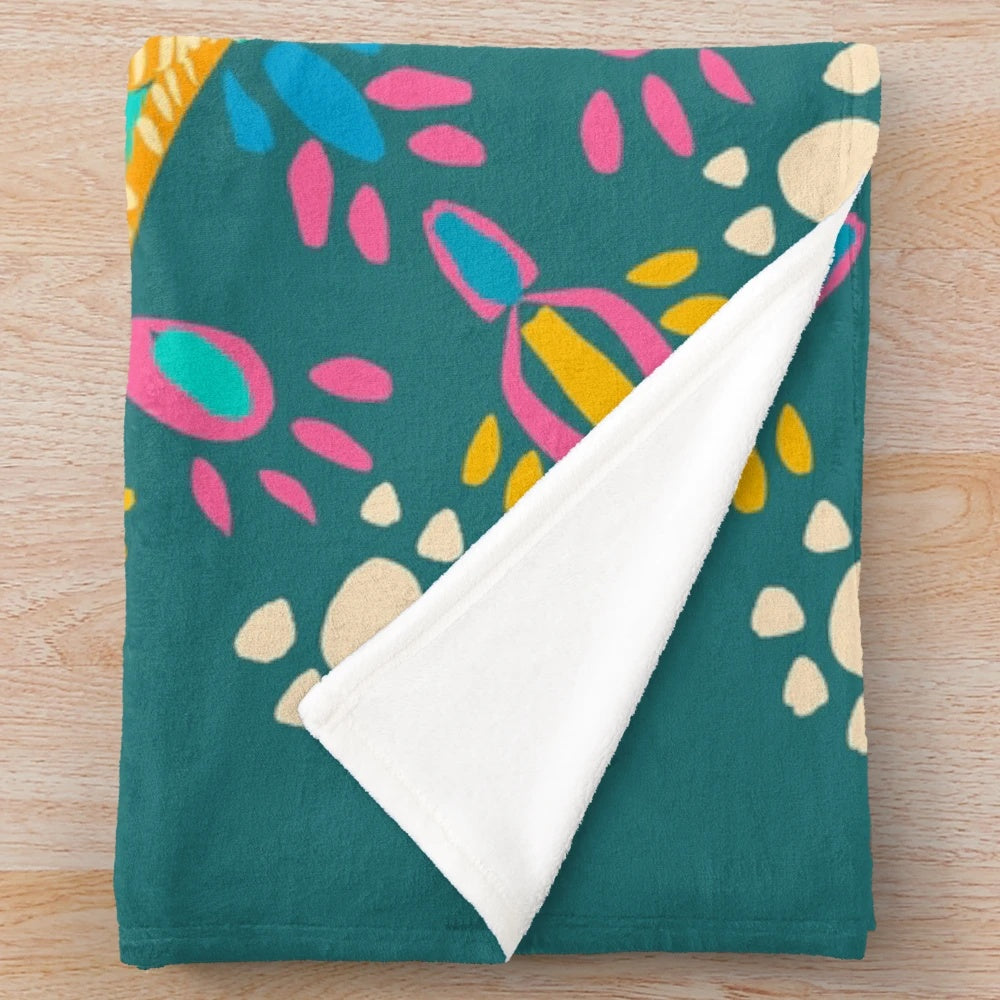Bohemian-inspired plush blanket with colorful mandala and sacred geometry designs