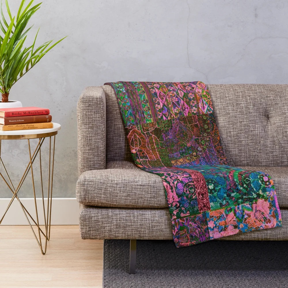 Vibrant, colorful bohemian plush blanket with a playful, hippie-inspired pattern