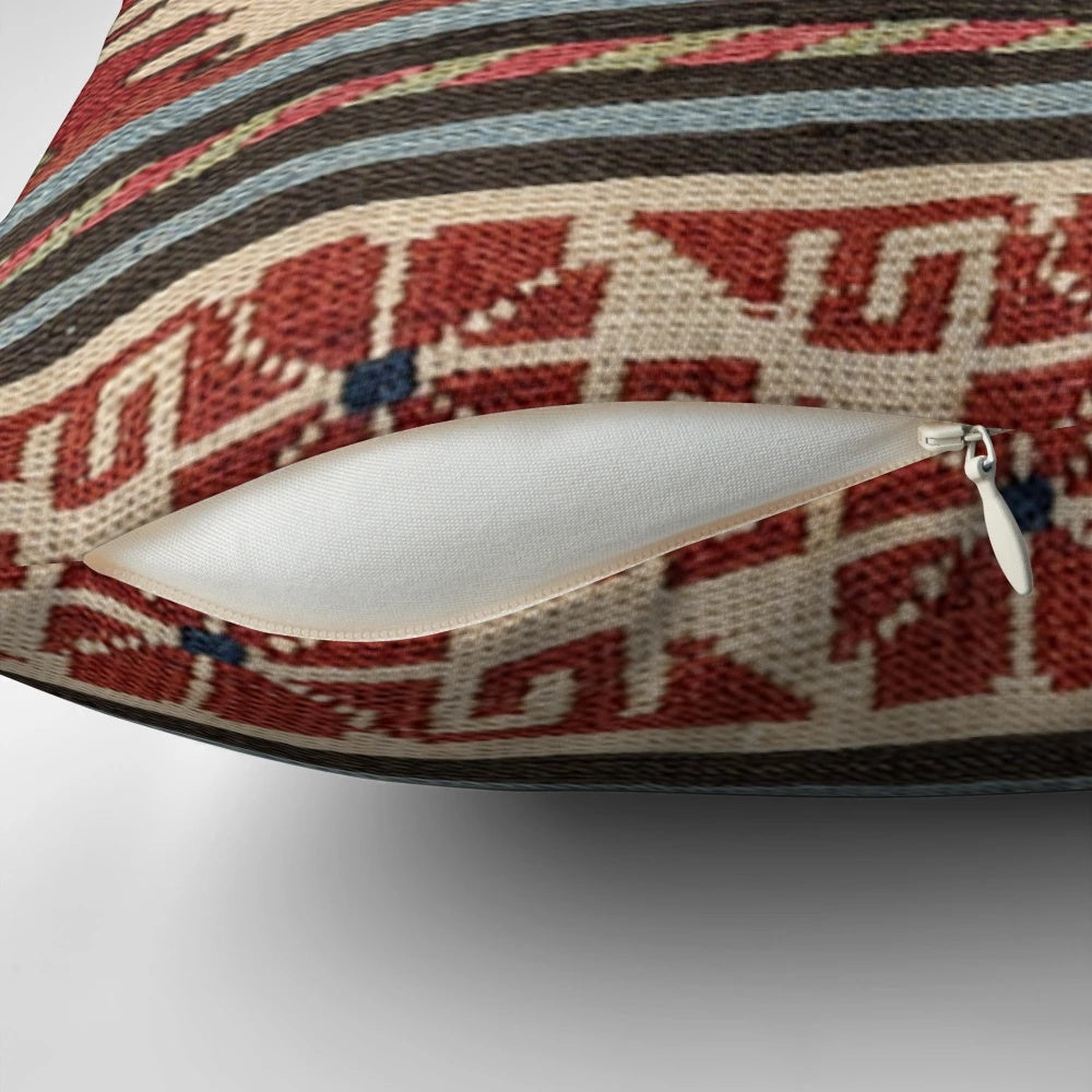 Colorful bohemian-inspired throw pillow with abstract Aztec pattern and retro sunburst design