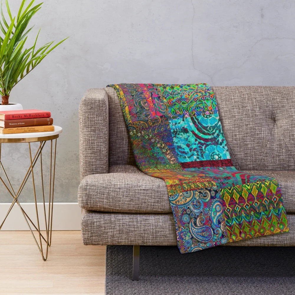 Vibrant bohemian plush blanket with rainbow patterns and textures