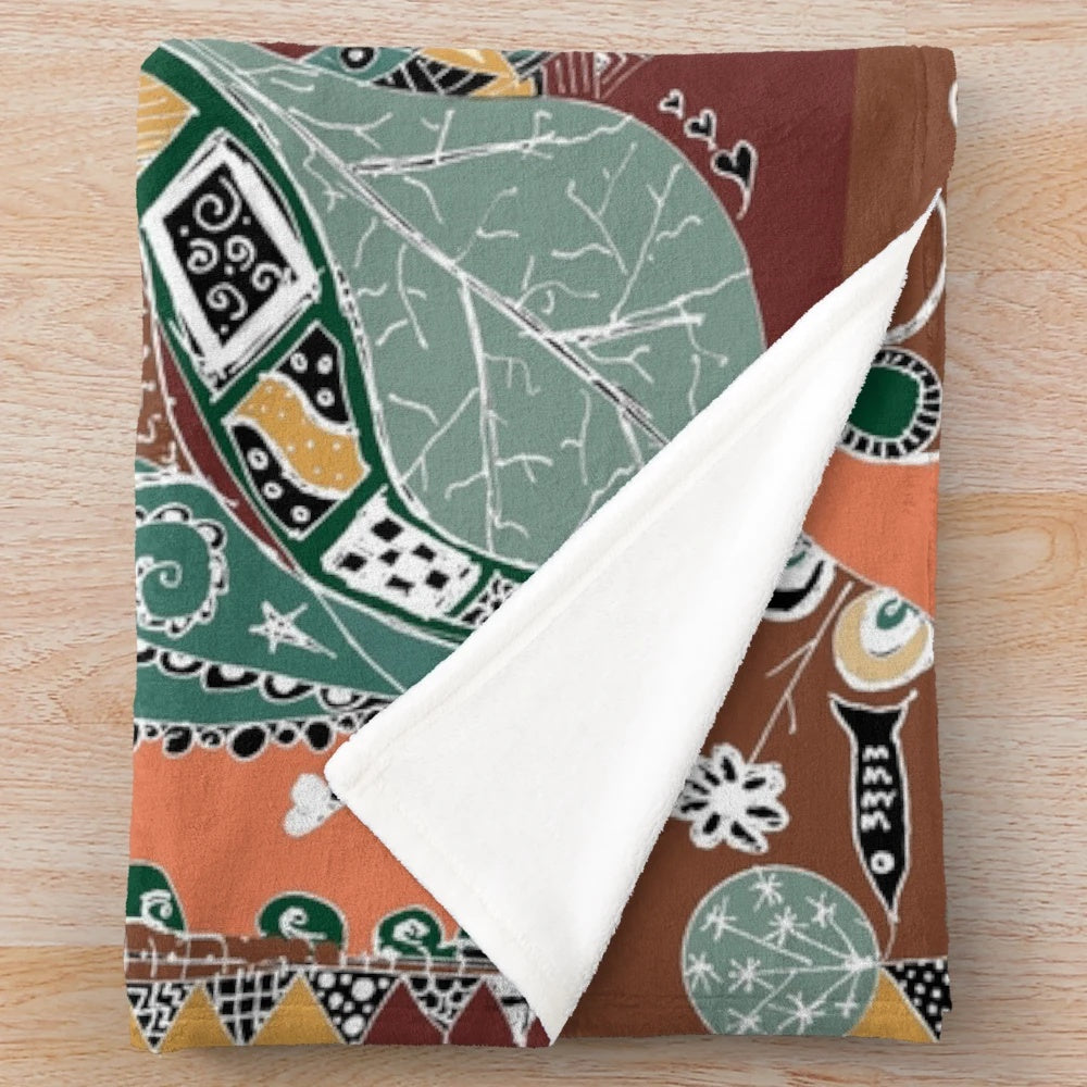 Plush blanket with vibrant boho-inspired abstract patterns and nature-inspired design