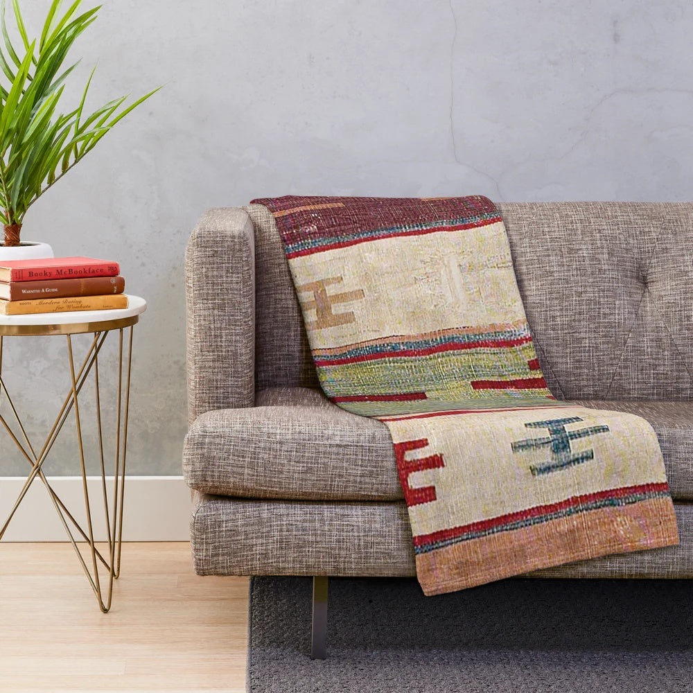 Colorful boho-inspired plush blanket with abstract, southwestern-style pattern