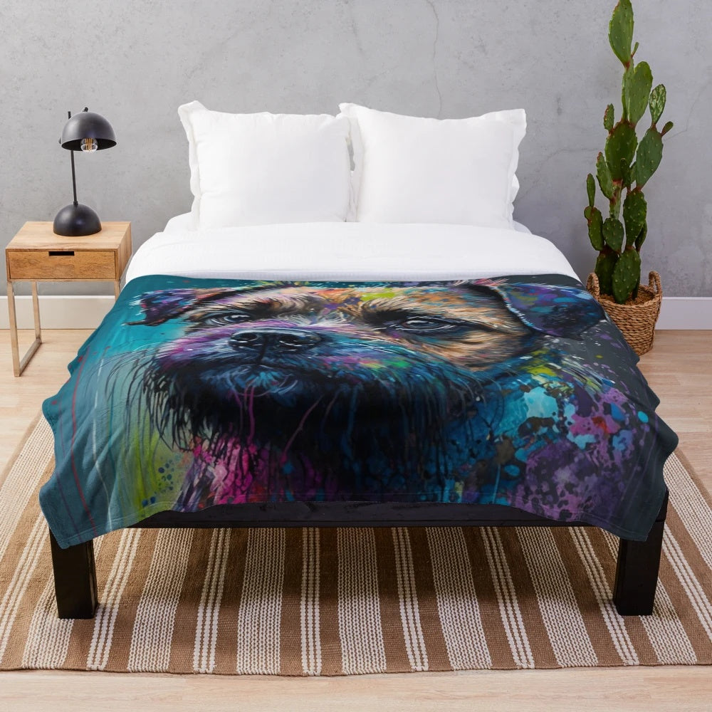 Colorful plush blanket featuring a border terrier dog in a synesthetic splash art style