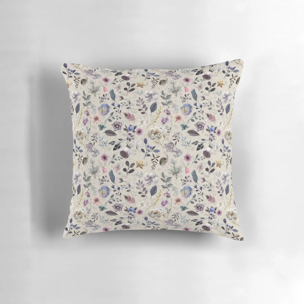 A beautiful botanical pattern pillow with watercolor floral designs, perfect for spring and summer home decor.