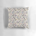 A beautiful botanical pattern pillow with watercolor floral designs, perfect for spring and summer home decor.