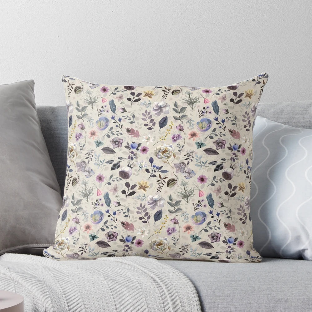 A beautiful botanical pattern pillow with watercolor floral designs, perfect for spring and summer home decor.