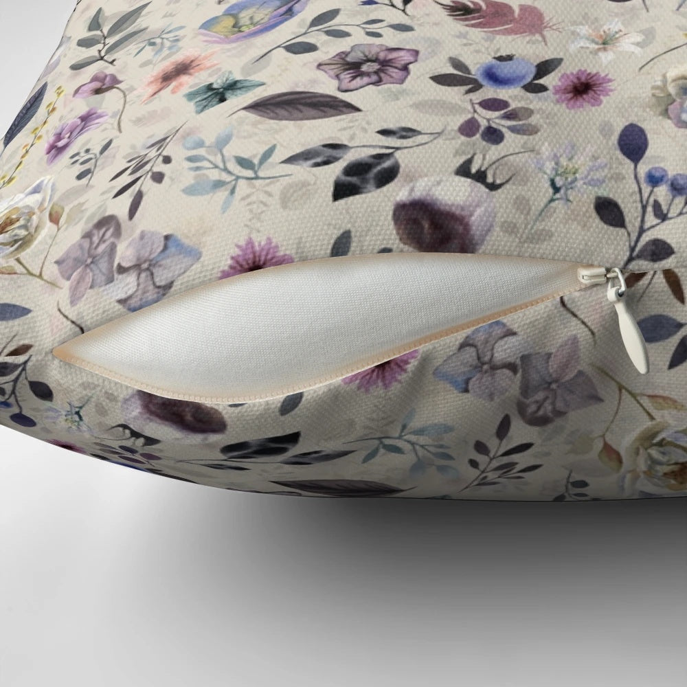 A beautiful botanical pattern pillow with watercolor floral designs, perfect for spring and summer home decor.