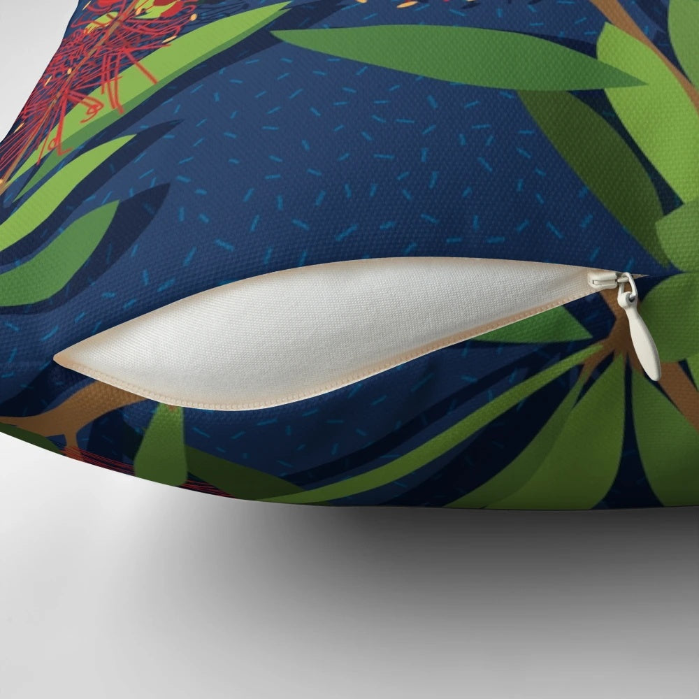 Pillow featuring a close-up image of the vibrant red bottlebrush flowers, a native Australian plant.
