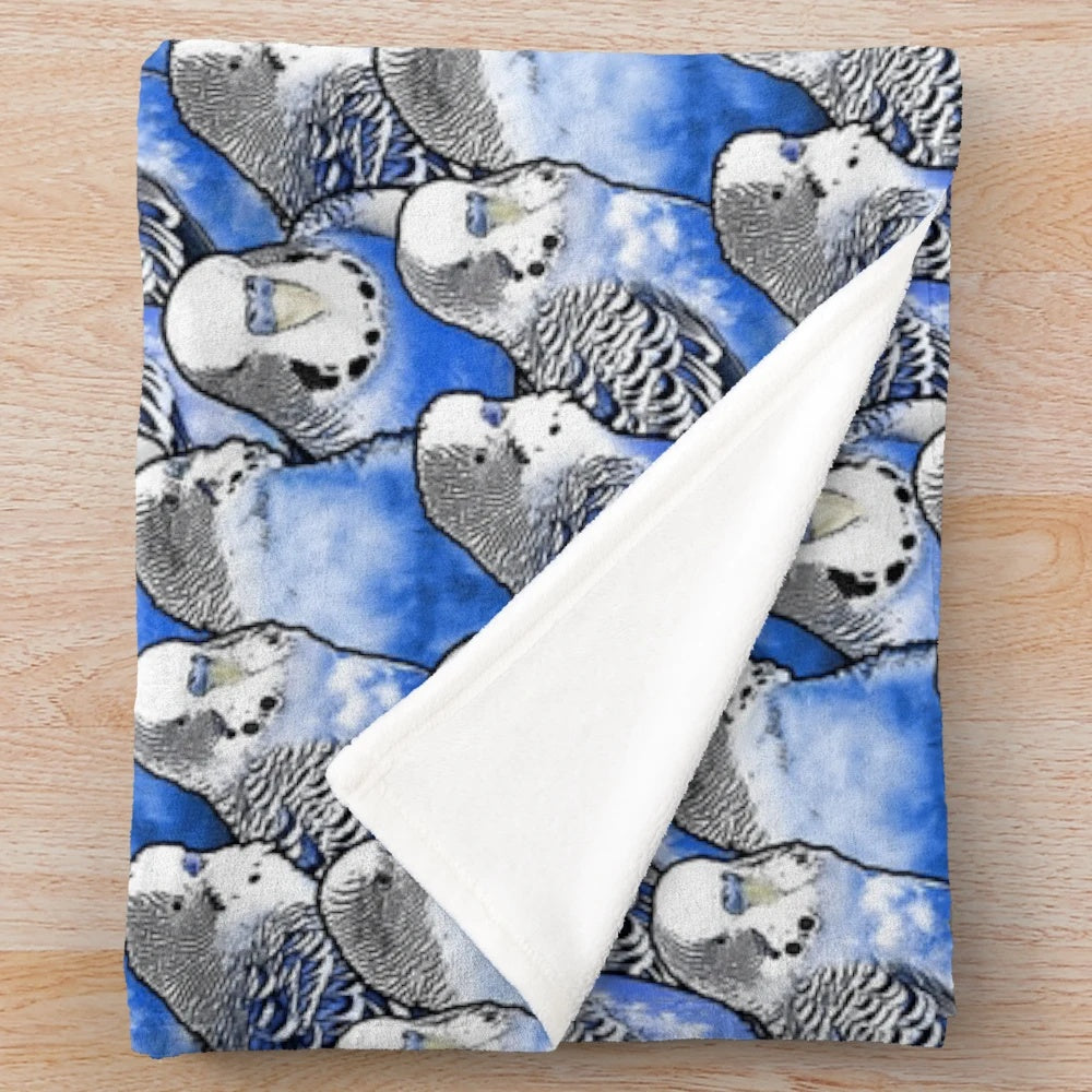 Colorful plush blanket featuring a vibrant budgie blue pattern