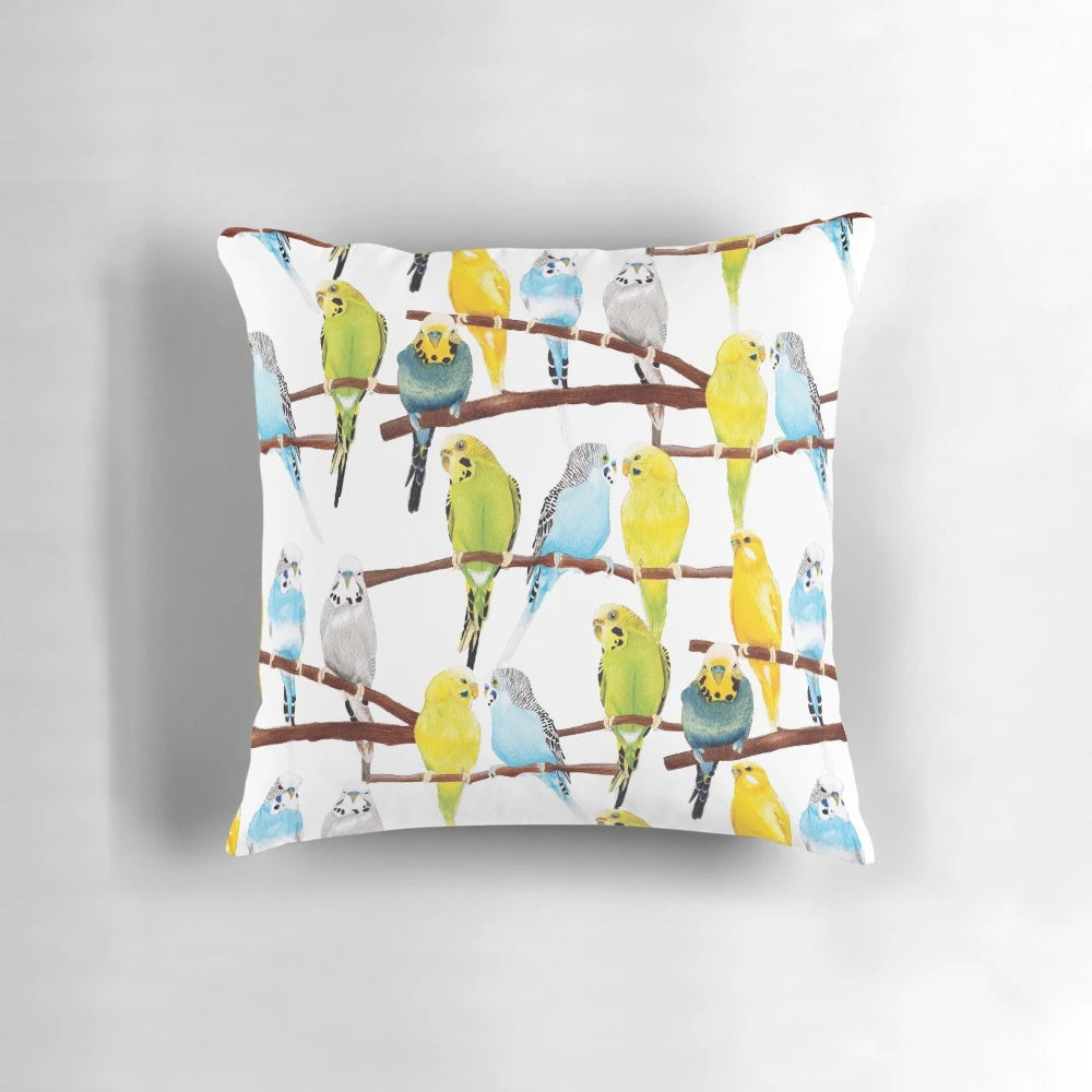 Soft, decorative pillow featuring a vibrant watercolor pattern of budgies in shades of yellow, blue, green, and grey.