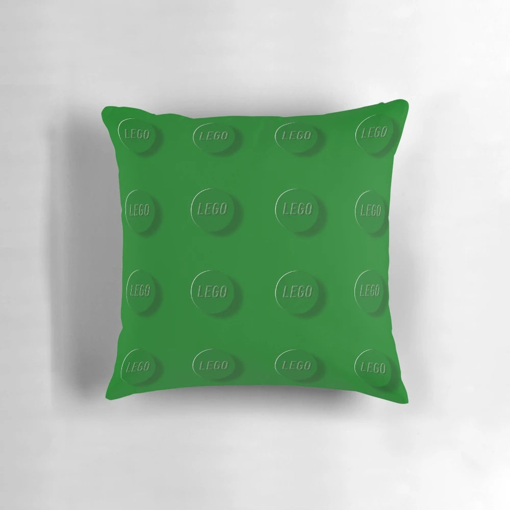 Green Pillow with Lego-style Building Bricks Design