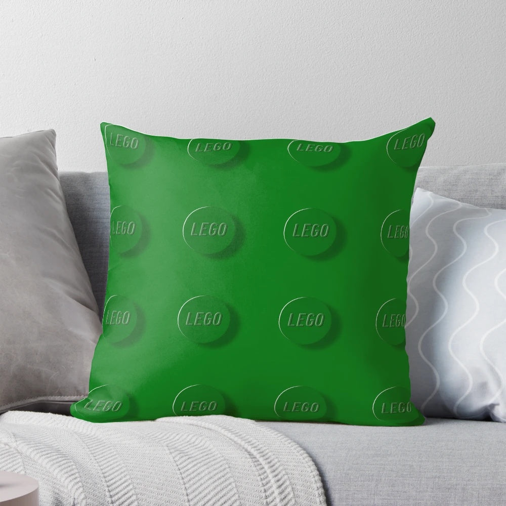 Green Pillow with Lego-style Building Bricks Design
