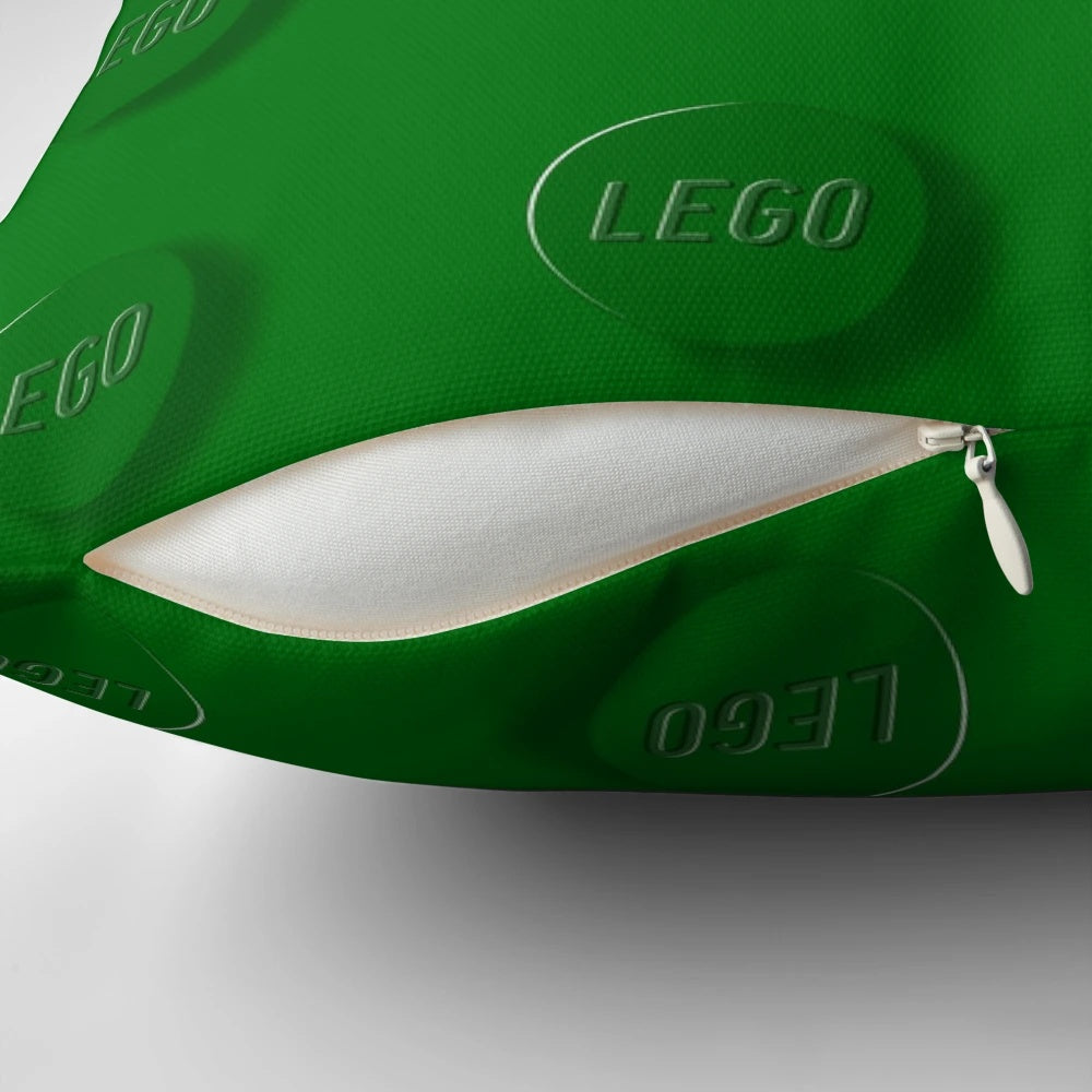 Green Pillow with Lego-style Building Bricks Design