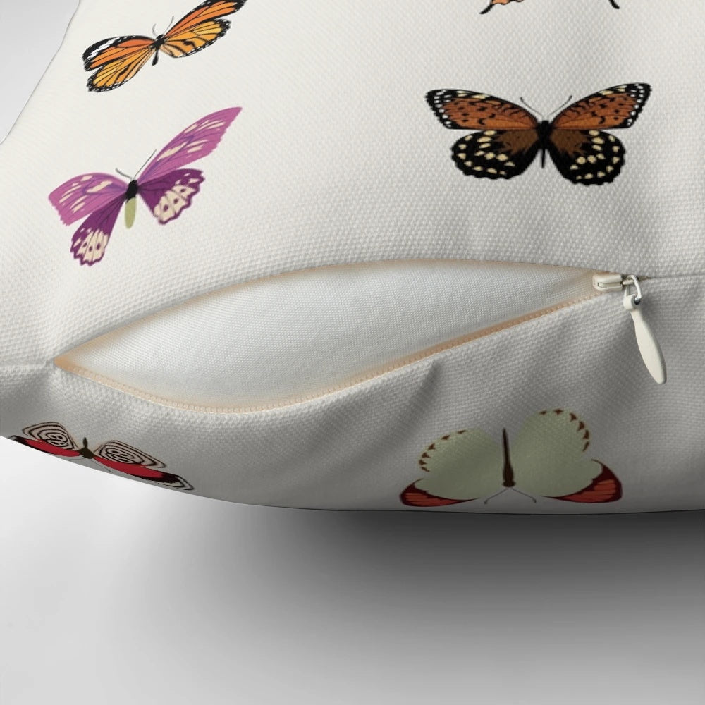 Colorful butterfly pattern throw pillow, featuring a vibrant design of butterflies in various natural shades.