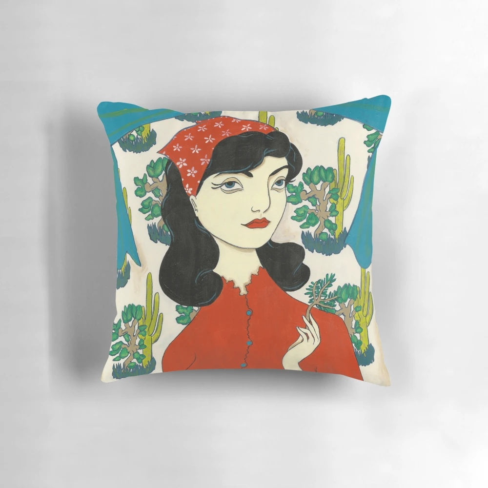 A vibrant, retro-inspired pillow featuring a portrait of a woman surrounded by colorful cacti.