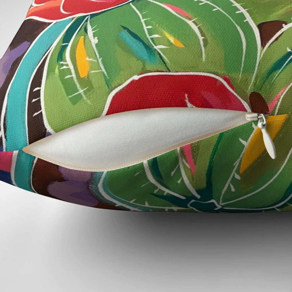 Decorative pillow featuring a colorful cactus blossom design in a southwestern style