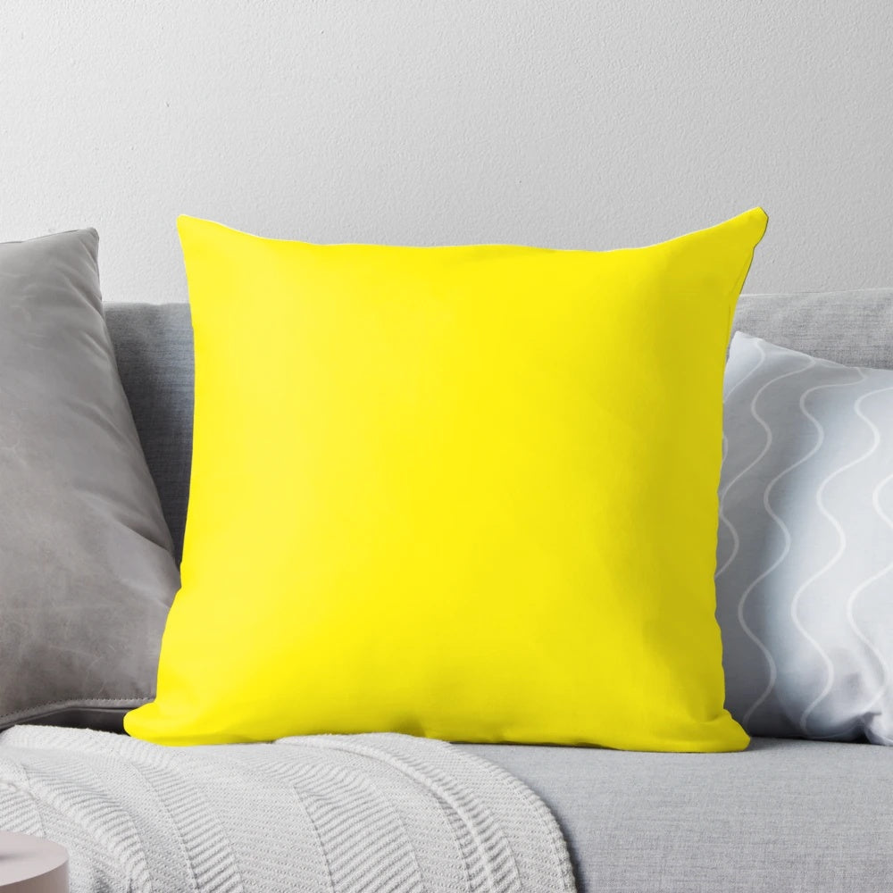 Vibrant canary yellow pillow with a range of yellow shades