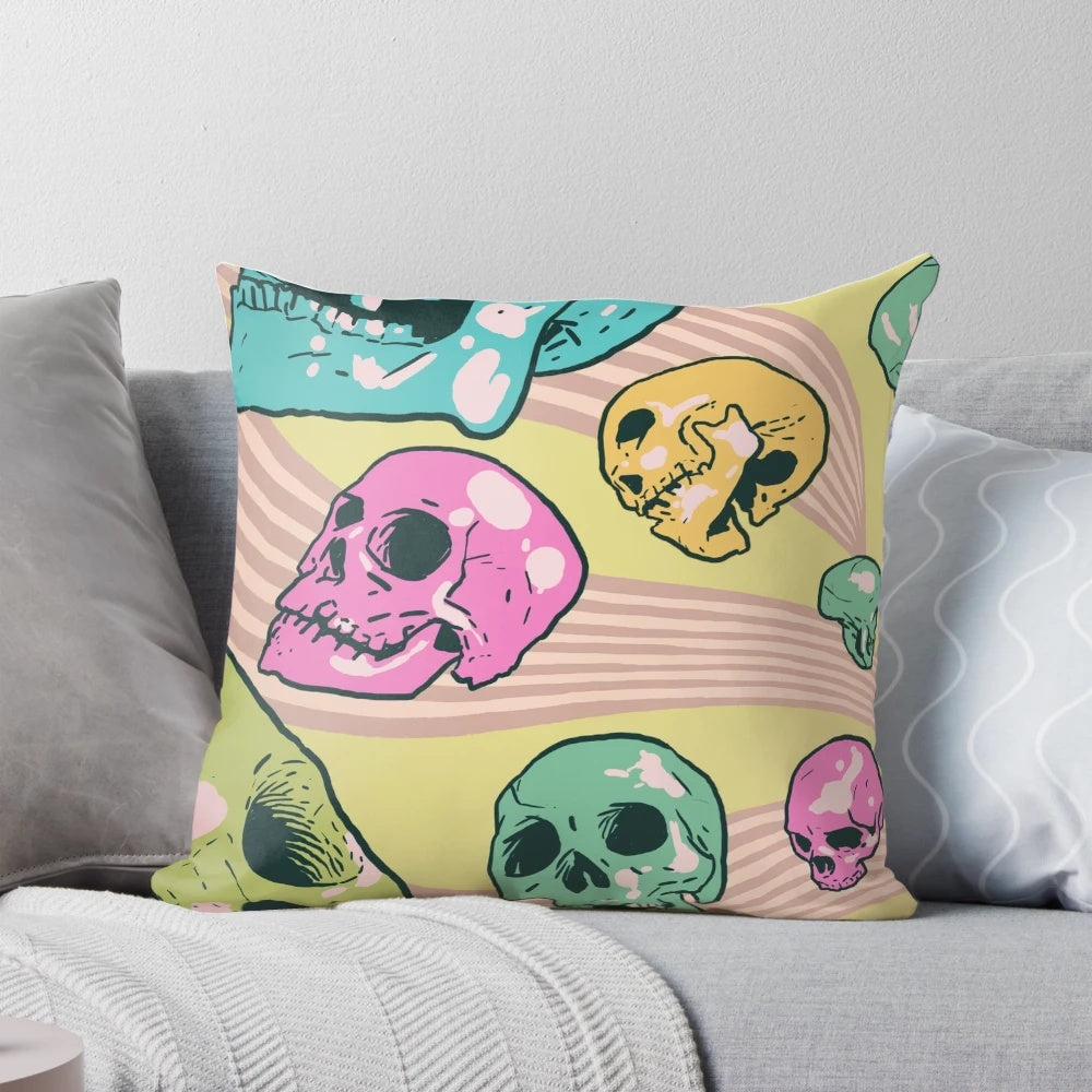 Colorful pillow featuring a psychedelic pop art design of candy skulls