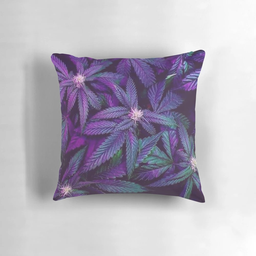 Colorful pillow featuring psychedelic purple cannabis/marijuana leaves