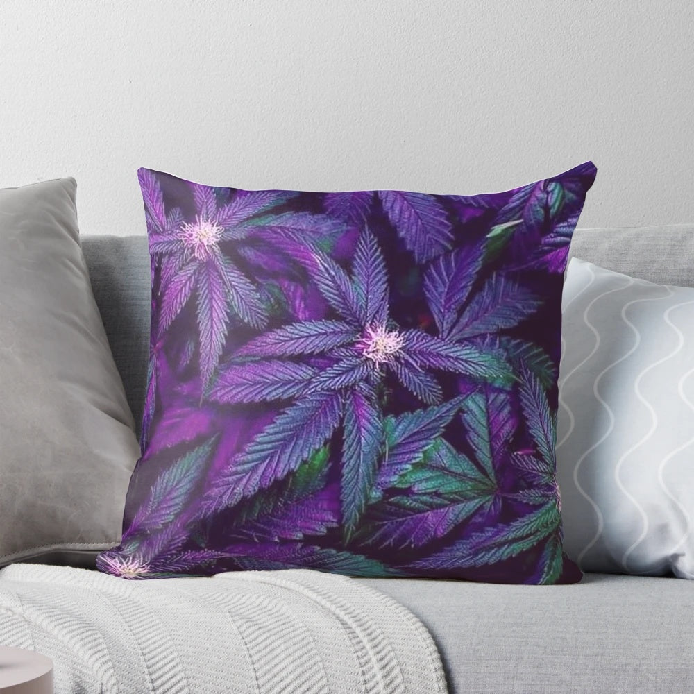 Colorful pillow featuring psychedelic purple cannabis/marijuana leaves