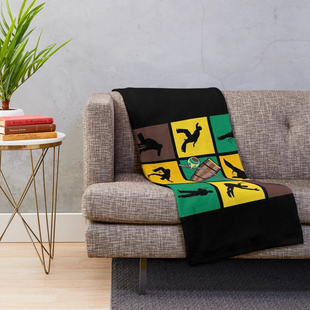 Colorful Capoeira-inspired plush blanket with silhouettes of martial arts fighters in dynamic poses