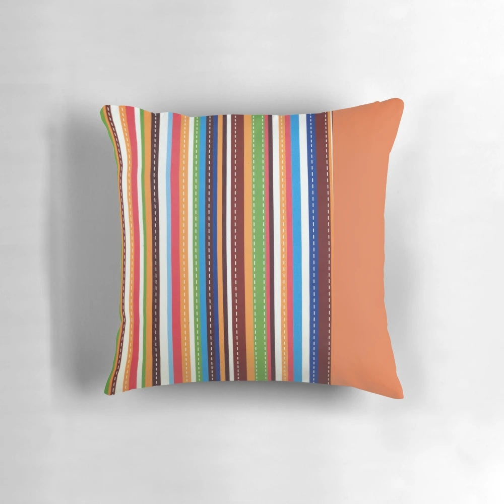 Brightly colored orange and white striped pillow with a fun stitched carrot design, perfect for adding a pop of preppy style to any room.
