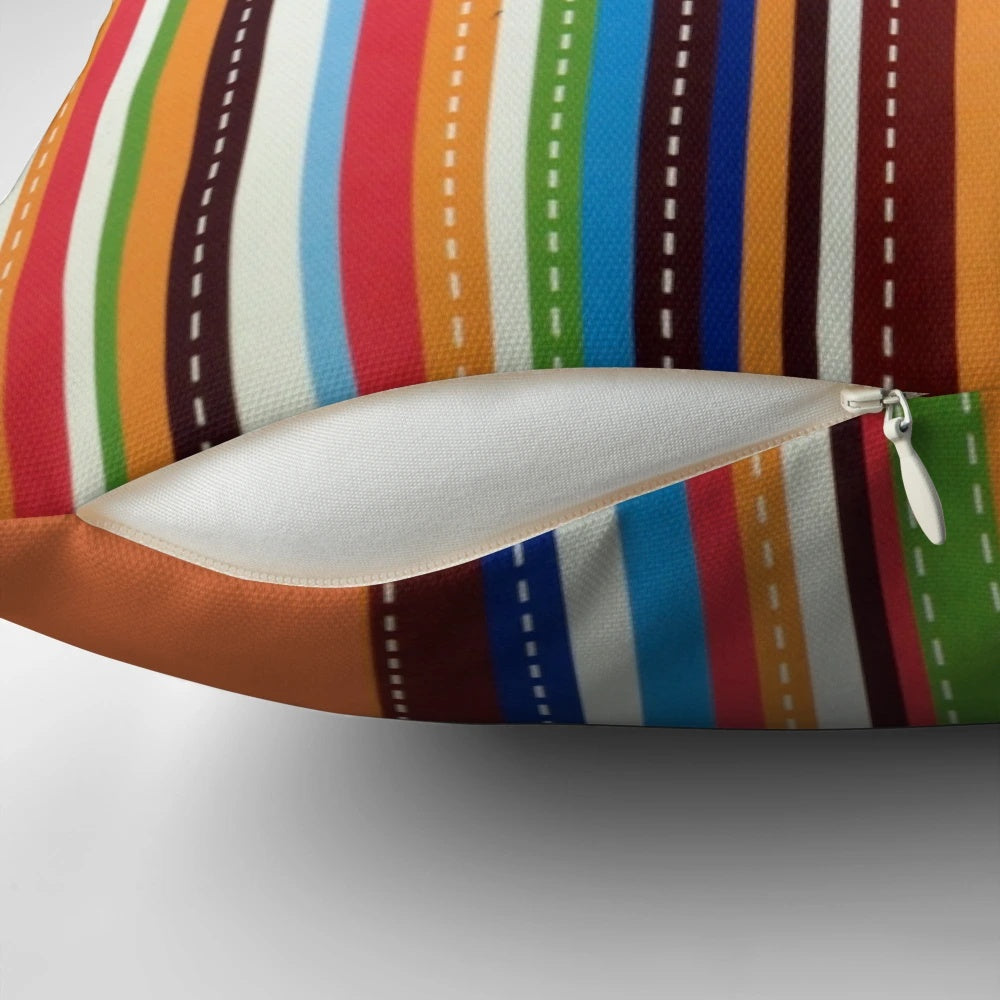 Brightly colored orange and white striped pillow with a fun stitched carrot design, perfect for adding a pop of preppy style to any room.
