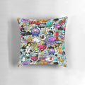 Colorful pop art inspired pillow featuring hand-drawn cartoon faces in a graffiti-style comic design.