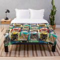 Colorful plush blanket featuring a collage of cats in various poses
