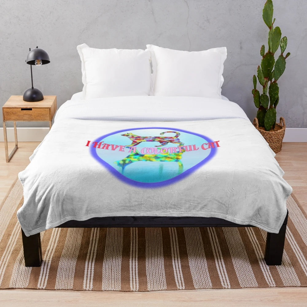 Colorful and whimsical plush blanket with artistic cat illustration
