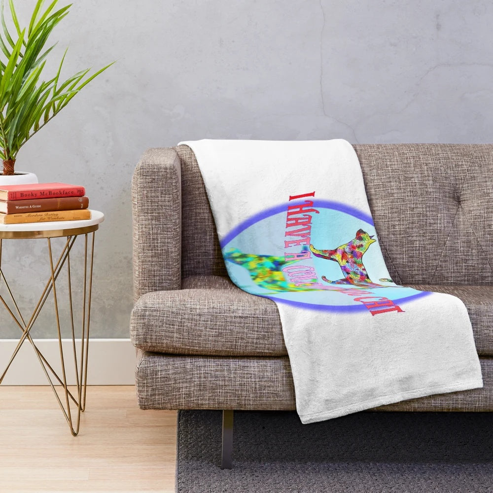 Colorful and whimsical plush blanket with artistic cat illustration