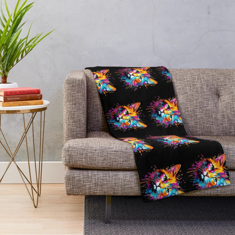 Colorful cat-themed plush blanket with splash pattern design