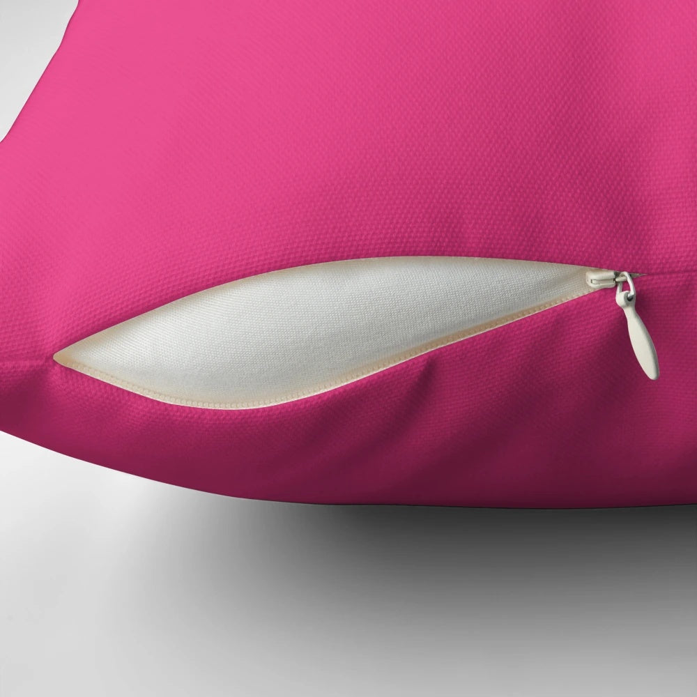 Cerise pink pillow with a variety of pink shades