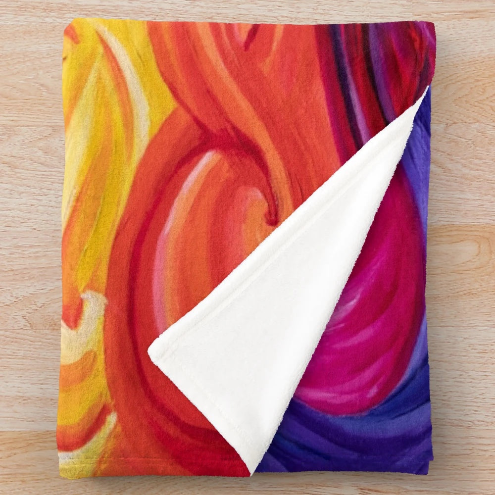 Colorful plush blanket featuring rainbow chakra art design
