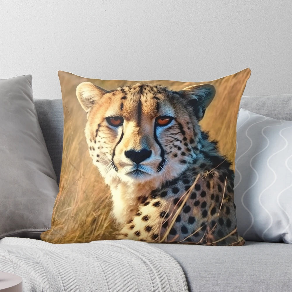 A high-quality decorative pillow featuring a close-up photograph of a cheetah's face against a natural background.