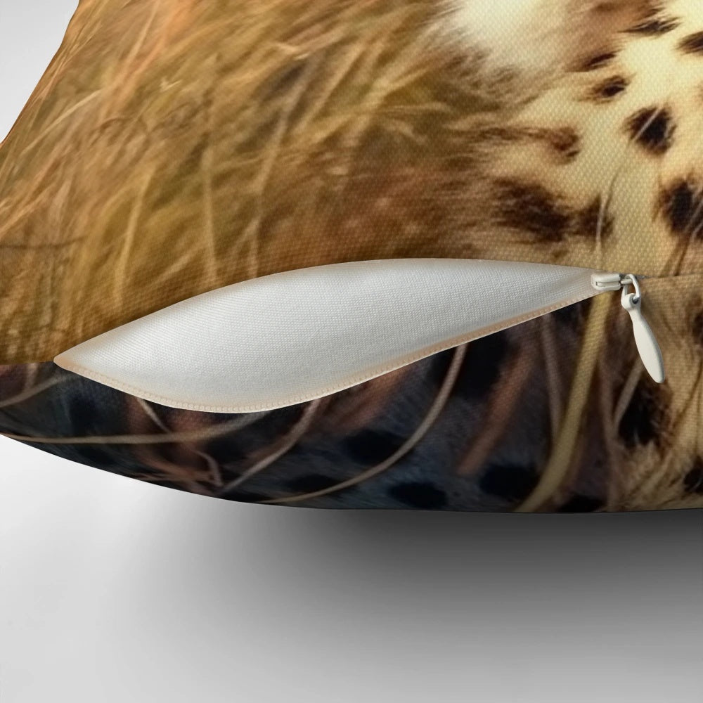 A high-quality decorative pillow featuring a close-up photograph of a cheetah's face against a natural background.