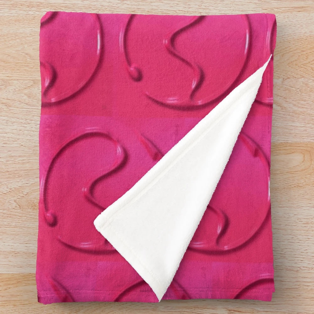 A plush, soft blanket featuring the Chromatica logo from Lady Gaga's album