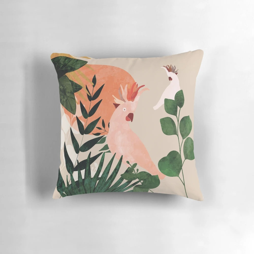 Vibrant throw pillow featuring a colorful cockatoo in a lush jungle setting with palm leaves and tropical foliage