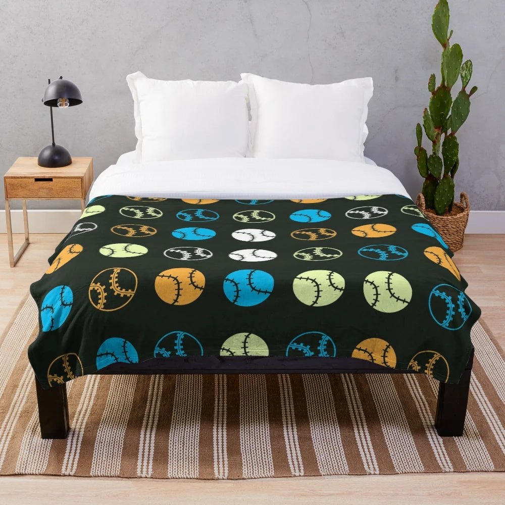 Colorful plush blanket featuring a gradient pattern of baseball icons