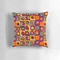 Colorful abstract art throw pillow featuring geometric circles and squares in a modern, Kandinsky-inspired design