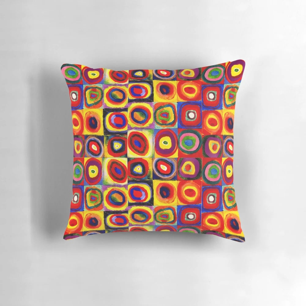 Colorful abstract art throw pillow featuring geometric circles and squares in a modern, Kandinsky-inspired design