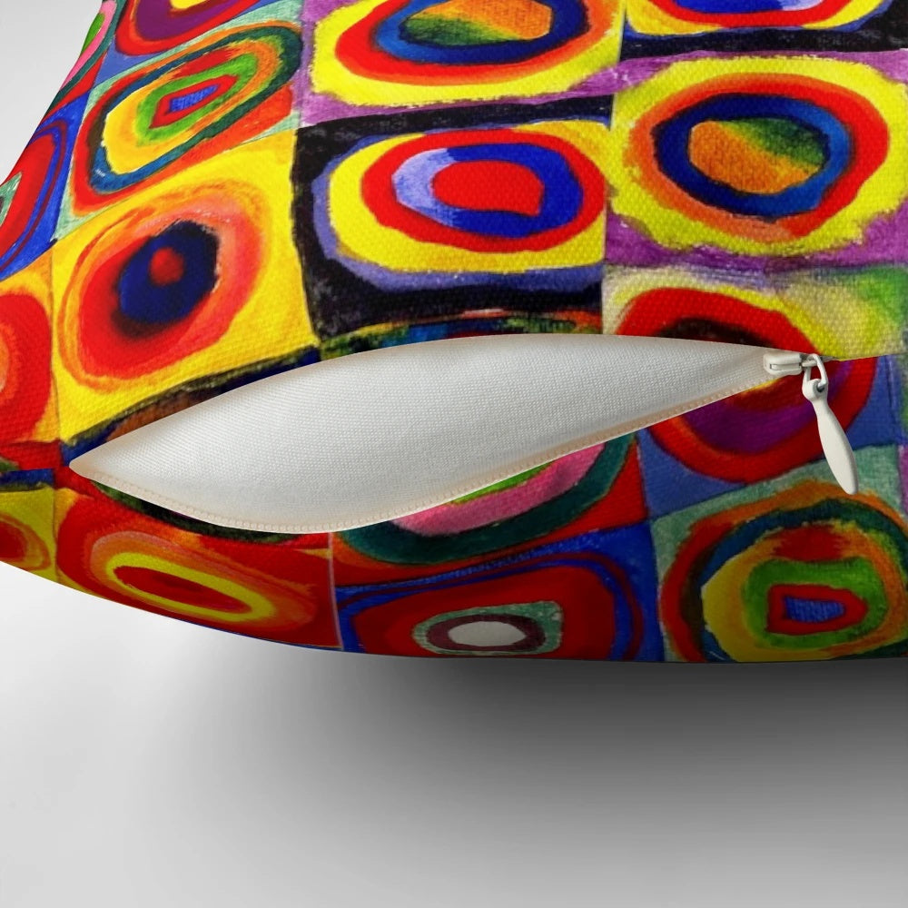 Colorful abstract art throw pillow featuring geometric circles and squares in a modern, Kandinsky-inspired design