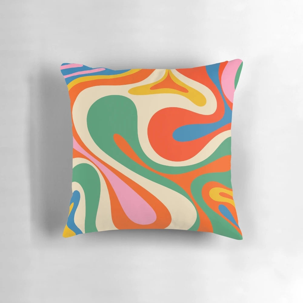 Vibrant, colorful abstract pattern on a modern throw pillow with a retro, psychedelic design.