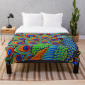 Colorful paisley peacock plush blanket with vibrant feather and mandala pattern