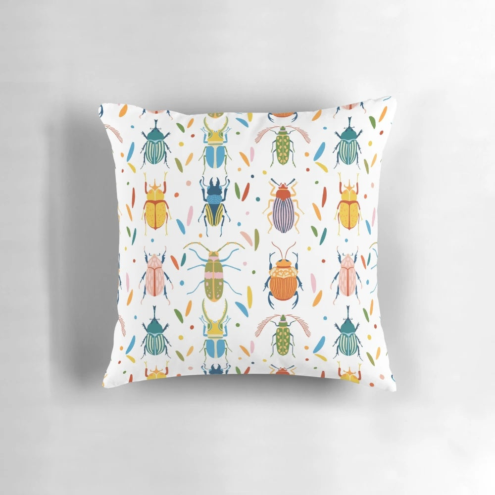 Colourful beetles print on a decorative pillow, showcasing the diverse and whimsical patterns of nature's insects.